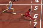 Former Arkansas Razorbacks runner Veronica Campbell-Brown of Jamaica (bottom) edged American Carmelita Jeter by 0.07 seconds to win her semifinal heat in the 200 meters Tuesday in London.