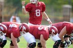 Arkansas quarterback Tyler Wilson was sharp during the Razorbacks' first preseason scrimmage on Tuesday. 