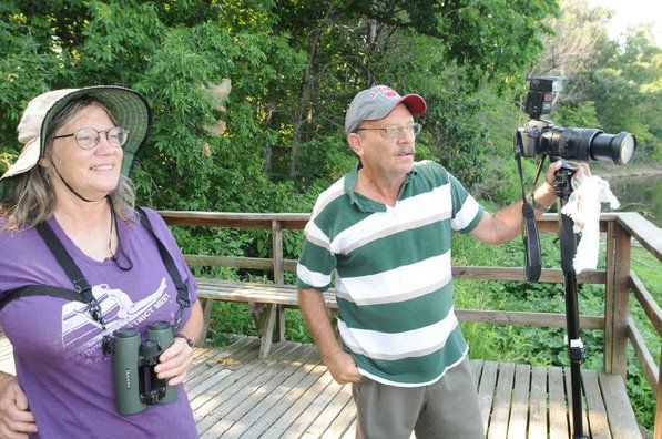 Joanie Patterson of Goshen and Stanfill look for birds at the wildlife viewing pavilion.