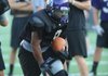 Brayden Cook, Fayetteville running back, carries the ball Tuesday during practice at Harmon Field. 