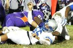 Offensive lineman Na’Ty Rodgers (top) of Pomfret, Md., has 29 scholarship offers but has narrowed his top-five list of schools to Arkansas, Maryland, Washington, Oklahoma and South Carolina. Video available at arkansasonline.com/videos. 
