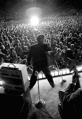 
                           No. 9: "Burning Love"
Released in August 1972, "Burning Love" peaked at No. 2 on the Billboard pop chart.

***

Elvis Presley concert, circa 1956
Photo by Alfred Wertheimer
