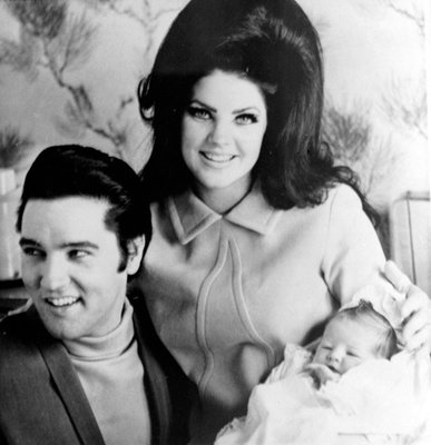 
                           No. 7: "Can't Help Falling in Love" rose to No. 2 on the Billboard charts in February 1962, after having been released as a single with "Rock-a-Hula Baby." It made No. 403 on Rolling Stone magazine's list of The 500 Greatest Songs of All Time. 

***

Elvis Presley is shown on Feb. 5, 1968, with his wife, Priscilla, and their newly born daughter, Lisa Marie. (AP Photo)