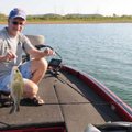 Brashers shows a white bass that hit a white War Eagle jigging spoon.