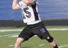 STAFF PHOTO DAVID FRANK DEMPSEY -- Elkins quarterback Mitchell Clark targets a receiver during a NWA Passing League game at Rogers Mounties Stadium in Rogers, Ark. on Monday, July 9, 2012.