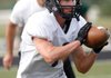 Trey Perkins, a Bentonville receiver, makes a catch during practice inside Tiger Stadium.