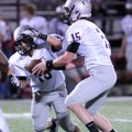 Austin Van Poucke, right, of Siloam Springs hands off to Scout Alexander on Tuesday at Bulldog Stadi...