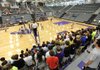 A Fayetteville player serves to Fort Smith Southside on Tuesday to begin the first varsity game in the Bulldogs’ new gymnasium.
