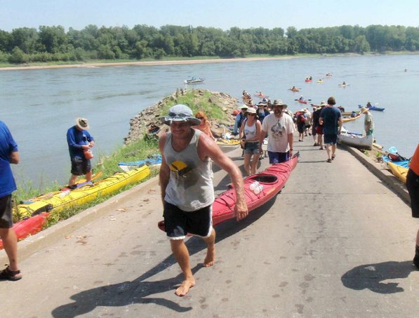 
                           Rumblers always help each other launch their boats during put-ins and take-outs. Milan Rodgers of Kansas City, at bow, helps Brian Duda of Illinois carry a kayak.       