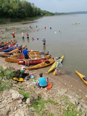 
                           Paddlers stop for a swim break. The Missouri River was low during the trip and sandbar beaches were numerous.      