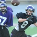 Jake Hornibrook, a Fayetteville defensive back, reaches to intercept a ball during practice at Harmo...