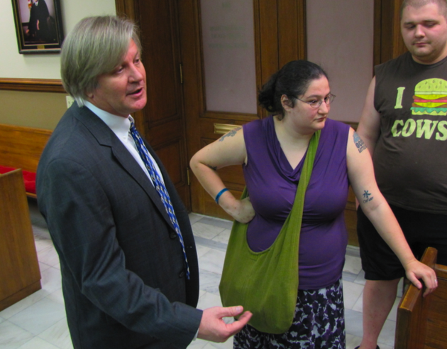 attorney-david-couch-speaks-beside-occupy-little-rock-member-kaitlin-lott-after-a-hearing-friday-in-pulaski-county-circuit-court