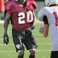 Qua Rose, left, a Springdale High defensive back, has shown he can be a hard hitter at free safety.