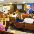 Members of Bethel Deaf Fellowship sign with Pastor Glenn Cleveland during worship on Sunday.