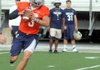 STAFF PHOTO ANTHONY REYES -- Shiloh Christian junior quarterback Daniel Shimer (3) looks for an open receiver during practice Wednesday, Aug. 1, 2012 at Champions Stadium in Springdale. 