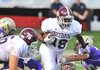 JIMMY JONES/Arkansas Democrat-Gazette - 8/27/12 - Stuttgart running back Tyler Luster (18) powers for yardage during the third quarter of Monday night's Kick Off Classic against the CAC Mustangs at War Memorial Stadium in Little Rock.