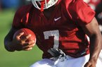 Arkansas running back Knile Davis ran five live plays in Friday’s mock game and fumbled after hitting the turf on his first carry. “Got the little fumble out of the way,” Davis said. “Glad it didn’t happen the first game.” Video available at arkansasonline.com/videos. 