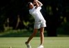 Hanna Brauburger, a Bentonville sophomore, hits from the second fairway on Tuesday during a match against Rogers Heritage at Bella Vista Country Club. Bentonville won both the girls’ and boys’ match.
