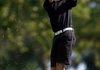 Jayson Jeffrey, a Bentonville senior, hits from the first fairway Tuesday during the match against Rogers Heritage.