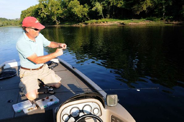 Lilley switches from casting and retrieving a jig to using a jig beneath a float. Both tactics worked to catch rainbow trout during the evening at Lake Taneycomo.
