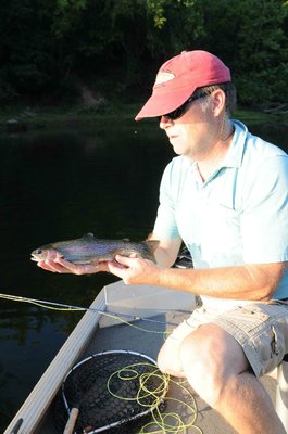 Lilley hooked this trout while fly fishing with a midge.