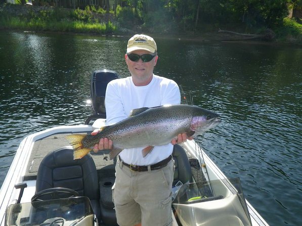 COURTESY PHOTO
Phil Lilley shows a rainbow trout he caught in July at Lake Taneycomo that measured 29 inches long. Lilley used a jig to catch the big trout about 500 yards downstream from the mouth of Fall Creek. Lilley said anglers have a chance at catching a large trout from Fall Creek upstream to Table Rock Dam.