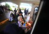 Rescuers evacuate residents of a nursing home Wednesday in Belle Chasse in Louisiana’s Plaquemines Parish as Hurricane Isaac lingered over the area, causing widespread flooding. 