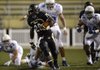 STAFF PHOTO MARC F. HENNING -- Bentonville running back Tearris Wallace breaks away for a big gain on a carry during the third quarter of the Tigers' season opener Friday, Aug. 31, 2012, against Kansas City (Mo.) Rockhurst at Tiger Stadium in Bentonville.