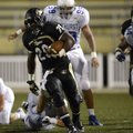 STAFF PHOTO MARC F. HENNING -- Bentonville running back Tearris Wallace breaks away for a big gain o...