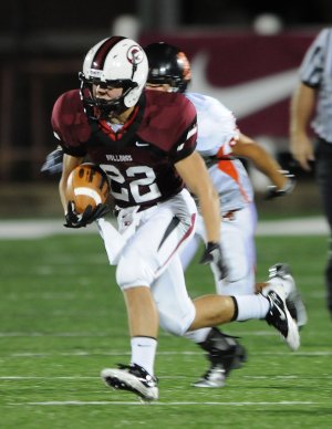 Colton Greenwood of Springdale runs downfield Friday. 