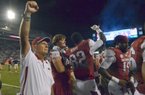 Arkansas Coach John L Smith (left) was eager to get back to work after Saturday’s victory over Jacksonville State. So eager, in fact, that he beat at least one media member to his Monday news conference.