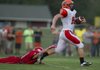 Malvern quarterback Austin Warford scores on a 48-yard run in the Leopards’ 31-28 victory at Glen Rose on Monday night. 