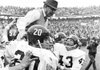 ** FILE ** In this Jan. 1, 1966 file photo, Alabama coach Paul "Bear" Bryant gets a ride on the shoulders of his team after Alabama beat Nebraska, 34-7 in the Sugar Bowl in New Orleans. Halfback Eddie Propst (43) rushes up to congratulate his coach as others join in the celebration. In the foreground is Donnie Johnson (20). Once again, the Crimson Tide has a program the Bear would be proud of: unbeaten and ranked No. 1. (AP Photo/File)