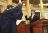 Hudson Hallum (right), D-Marion, is sworn in as the District 54 representative July 21, 2011, in the House Chamber by Arkansas Supreme Court Chief Justice Jim Hannah.