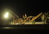 Construction crews work Tuesday evening putting in a new concrete barrier on interstate 540 in Fayetteville between the Wedding exit and MLK Jr Exit. The stretch will include the addition of another traffic lane for northbound and southbound traffic.