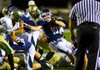 Houston Kennedy of Greenwood runs for a first down Friday against Alma. 