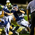 Houston Kennedy of Greenwood runs for a first down Friday against Alma. 