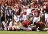 Arkansas Democrat-Gazette/RICK MCFARLAND --09/08/12-- Arkansas cornerback Tevin Mitchel (right) is attended to after a hard hit against Louisana-Monroe. Mitchel was taken from the game on a stretcher and diagnosed with "an injury above the shoulders". 