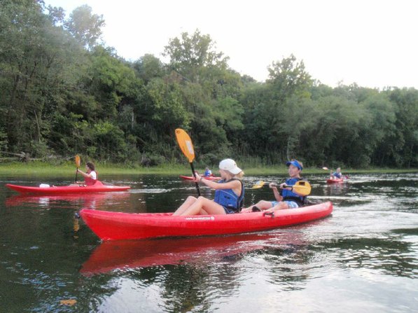 
                           Elise Franke, left, and Taylor Jones paddle a tandem kayak on the White River below Beaver Dam during an Outdoor Connection Center outing.        