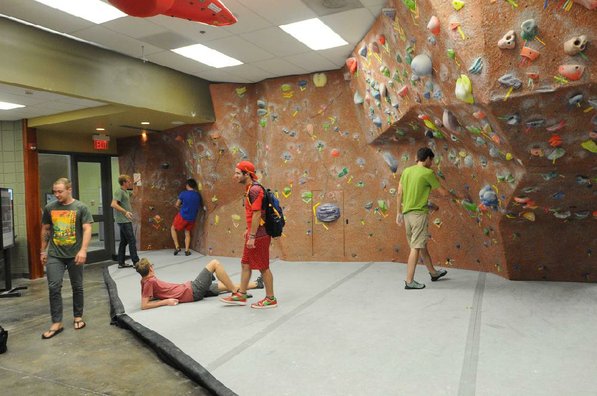 
                           A bouldering wall with padded floor is popular with students.