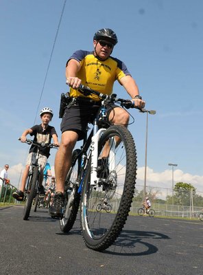 Cpl Will Gardner leads students on a ride to learn shifting and braking technique.