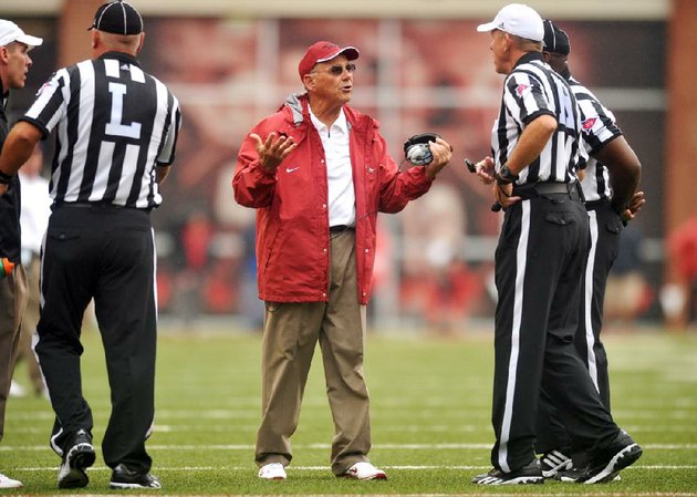arkansas-coach-john-l-smith-speaks-with-referees-during-saturdays-game-at-reynolds-razorback-stadium-in-fayetteville-smith-said-he-took-responsibility-for-replacing-sophomore-deep-snapper-will-dappollonio-with-junior-will-coleman-early-in-the-game