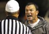 North Little Rock Coach Brad Bolding makes his point with an official during the Charging Wildcats’ 47-10 victory Friday night against Pine Bluff. The Zebras are coached by Bolding’s brother Bobby.