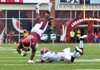 Arkansas’ Knile Davis loses the ball after being upended by Alabama’s Deion Belue during Saturday’s game at Reynolds Razorback Stadium. Davis was ruled down on the field, but a review overturned the call, giving Alabama the ball and resulting in Arkansas’ third lost fumble. The Razorbacks turned the ball over five times in the 52-0 loss, the worst Fayetteville setback in 93 years. Video available at Arkansasonline.com/videos 