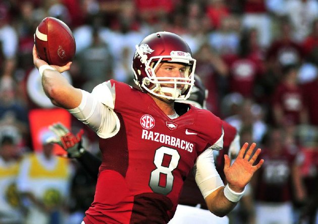 arkansas-quarterback-tyler-wilson-passes-during-the-first-quarter-of-an-ncaa-college-football-game-against-jacksonville-state-in-fayetteville-ark-saturday-sept-1-2012-ap-photoapril-l-brown