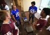 Benton’s Carson Holloway (bottom left) and Wallace Foote (bottom right) talk with Bryant’s Hayden Lessenberry (top left) and Kordell Boykins on Monday following a news conference to preview the annual Salt Bowl matchup Friday at War Memorial Stadium. Bryant has defeated Benton six consecutive times in the game, and Friday’s game marks the first conference meeting between the schools since 2001. It will be the ninth consecutive year the game has been held at War Memorial Stadium. 