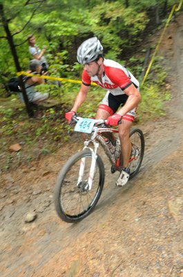 Derek King of Conway conquers the Gravity Cavity, a 15-foot-deep chasm along the race course.