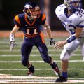 Peyton Combs, a Rogers Heritage senior, defends Harrison sophomore Clark Anderson during the first h...