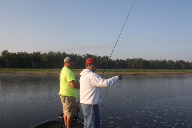 jeff-marks-of-crossett-left-and-greg-gulledge-of-monticello-work-topwater-lures-across-the-surface-of-lake-ferguson-in-search-of-largemouth-bass-the-lake-a-mississippi-river-oxbow-was-a-hot-spot-for-these-and-other-bass-anglers-this-summer-because-of-the-water-flowing-out-of-the-upper-lake-toward-the-mississippi
