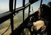 An Iraqi air force pilot looks out of a C-130 in this photograph from 2008, the year Little Rock Air Force Base personnel first began training Iraqis on the cargo planes. 